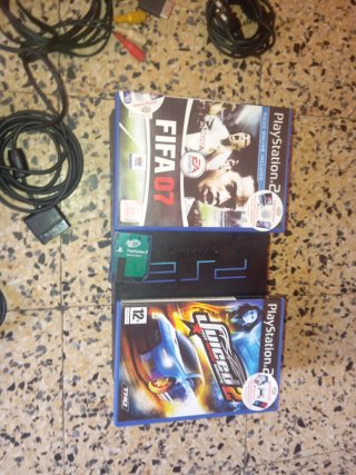 Console PS2 con controller e giochi, memorical