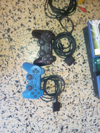 Console PS2 con controller e giochi, memorical