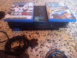 Console PS2 con controller e giochi, memorical