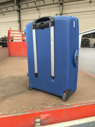Maleta Samsonite azul con ruedas y asa