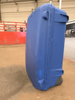 Maleta Samsonite azul con ruedas y asa
