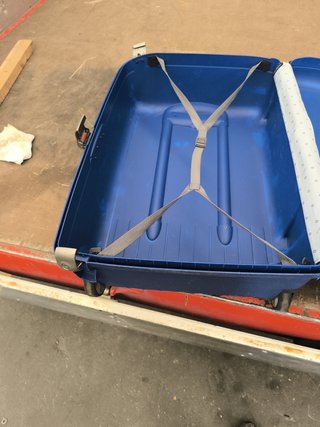 Maleta Samsonite azul con ruedas y asa