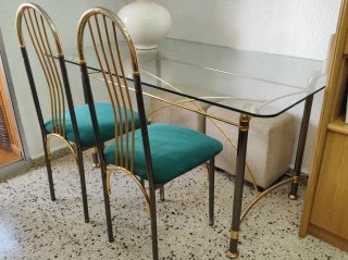 Mesa de cristal con 4 sillas