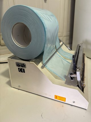 Selladora de metal con rollos papel