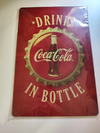 Dos pósters Metálicos de Coca-Cola