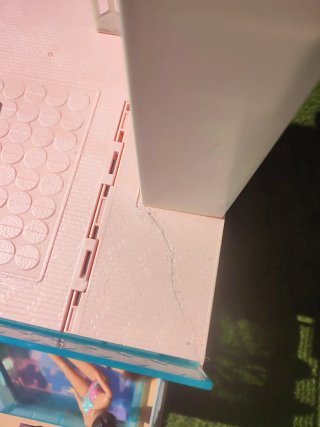 Casa de muñecas Barbie con tobogán