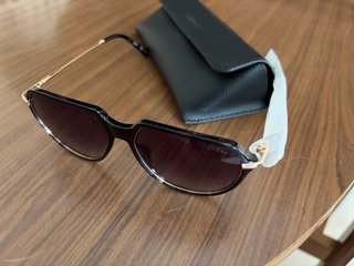 Gafas de sol Guess negras y doradas