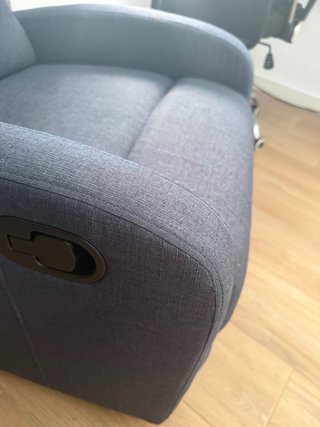 Sillón reclinable gris tela