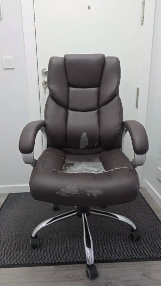 Sillón de despacho para restaurar
