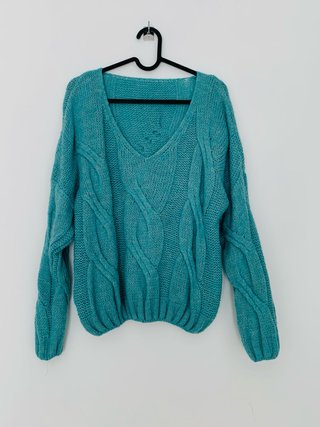 Jersey de ochos con corte clásico.