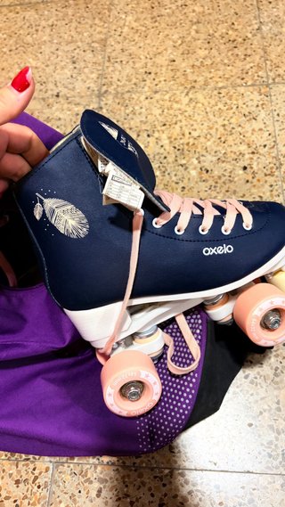 Patines infantiles Oxelo morados con mochila t36