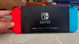 Nintendo Switch + Custodia da Viaggio