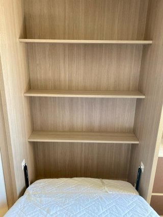 Cama plegable pared