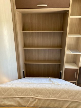 Cama plegable pared