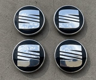 4 Tapabujes SEAT 56mm negro plata originales nuevo