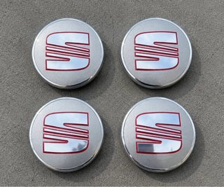 4 Tapabujes Seat 56mm gris plata originales nuevo