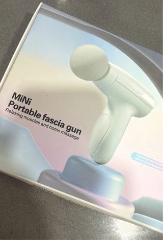 Mini pistola de masaje facial portátil