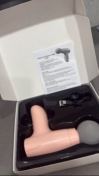 Mini pistola de masaje facial portátil