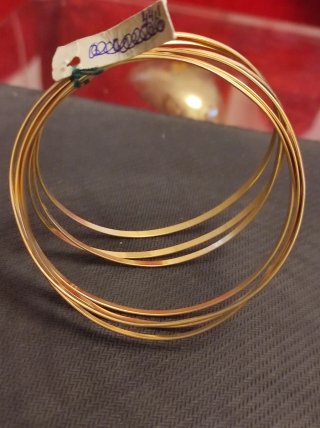 Pulsera semanario oro de dieciocho quilates