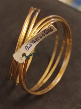 Pulsera semanario oro de dieciocho quilates