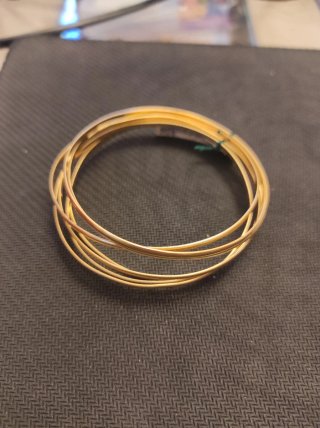 Pulsera semanario oro de dieciocho quilates