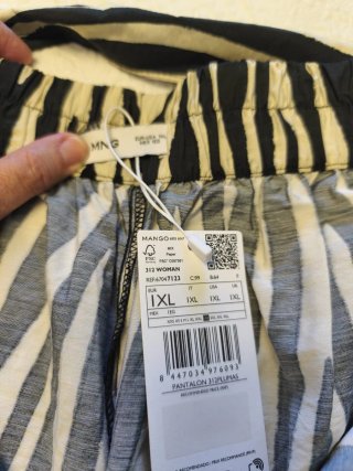 Pantalones fluidos Mango estampado cebra