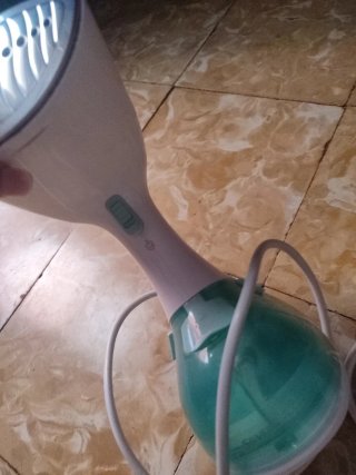 Vaporizador de ropa portátil