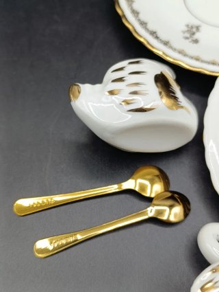 Salero y pimentero de porcelana cisne