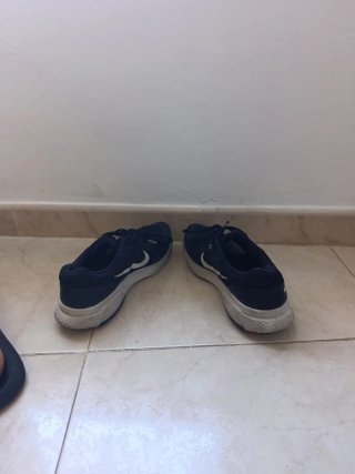 Zapatillas deportivas Nike azules y blancas
