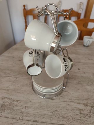 Juego 5 tazas café porcelana con soporte.