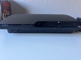 PS3 Slim 150GB + 4 mandos + 14 juegos