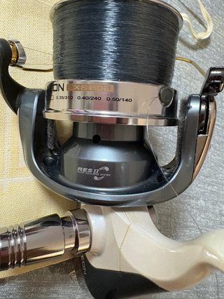 Carrete de pesca AXEON