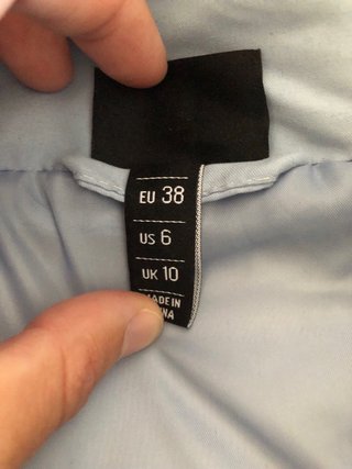 Abrigo azul de la marca Ellesse