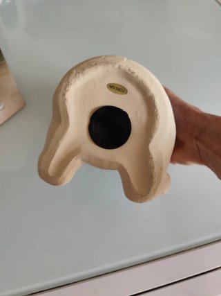 Salvadanaio cane terracotta con fiocco