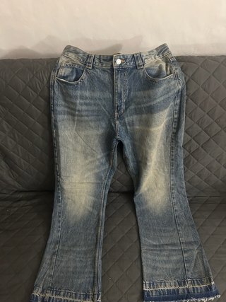 Jeans vita alta a zampa