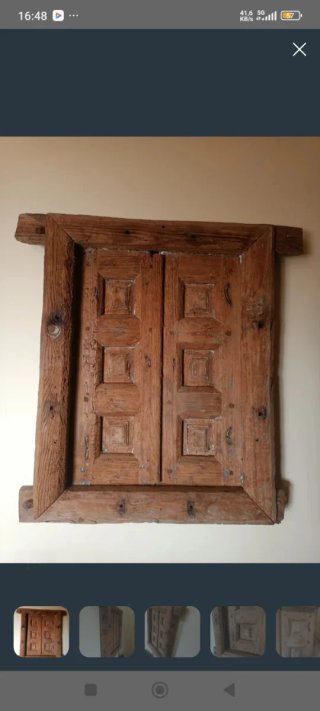 Ventana rústica centenaria de madera