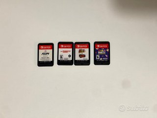 Nintendo Switch OLED + 4 giochi + 2 Joy-Con