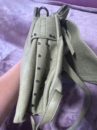Mochila Desigual verde,. 1solo uso. Sin roces.