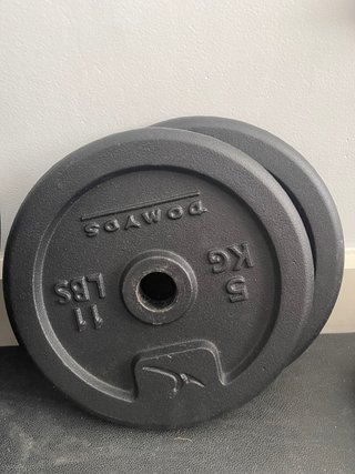 Discos de peso DOMYOS 5 kg y 11 lbs