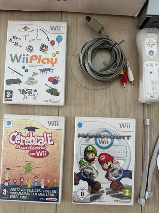 Nintendo Wii + 2 mandos + juegos