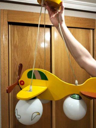 Lámpara infantil avión amarillo