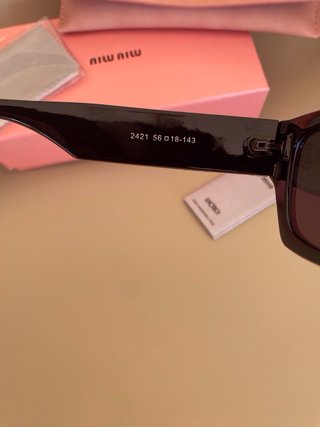Gafas de Sol miumiu Rectangulares Negras