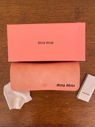 Gafas de Sol miumiu Rectangulares Negras