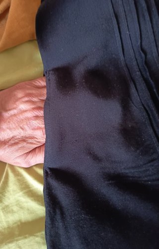Vestito smanicato al ginocchio