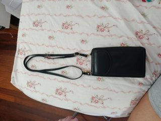 Cartera móvil MINISO negra