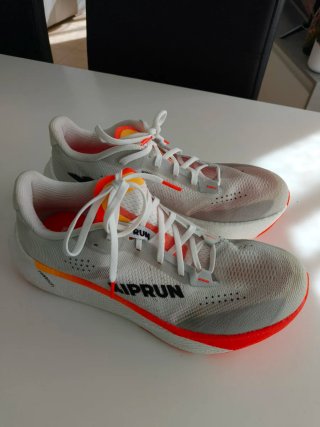 Zapatillas Kiprun Kipride Blancas y Naranjas