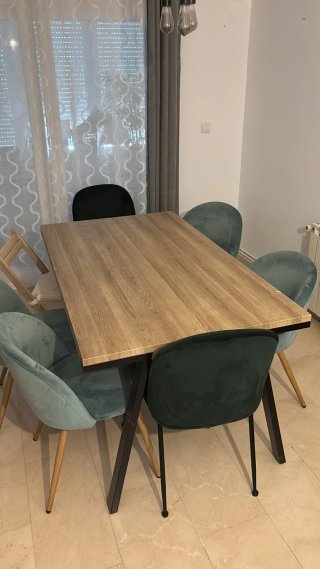 Juego de mesa y 4 sillas verdes