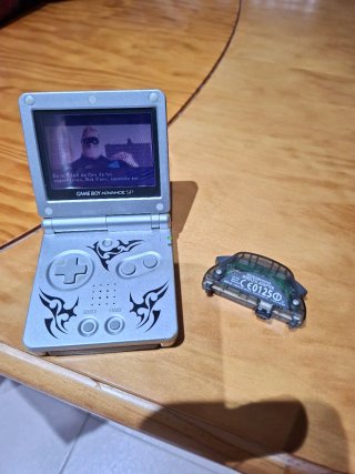 Nintendo Game Boy Advance SP + Adaptador Wireless.
