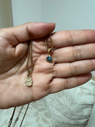 Pack 2 collares dorados ojo y mano