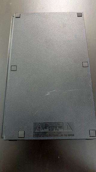 PlayStation 2 con cámara y juegos